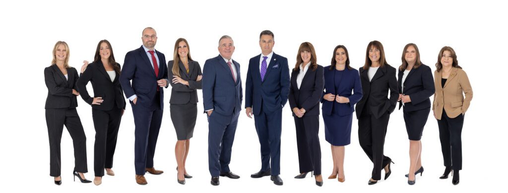 Trusted attorneys law firm team composite group photo in Smithtown, NY